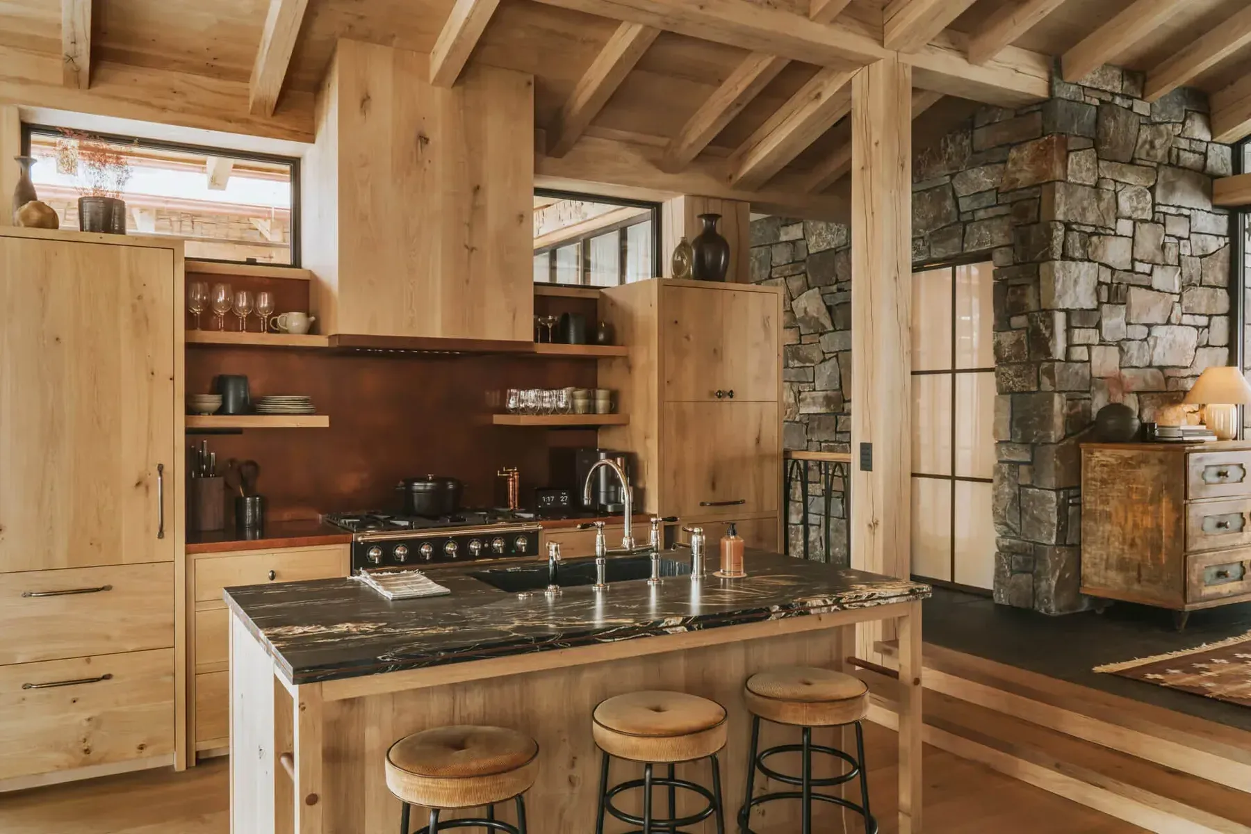 Custom kitchen with timber beams and stone detailing