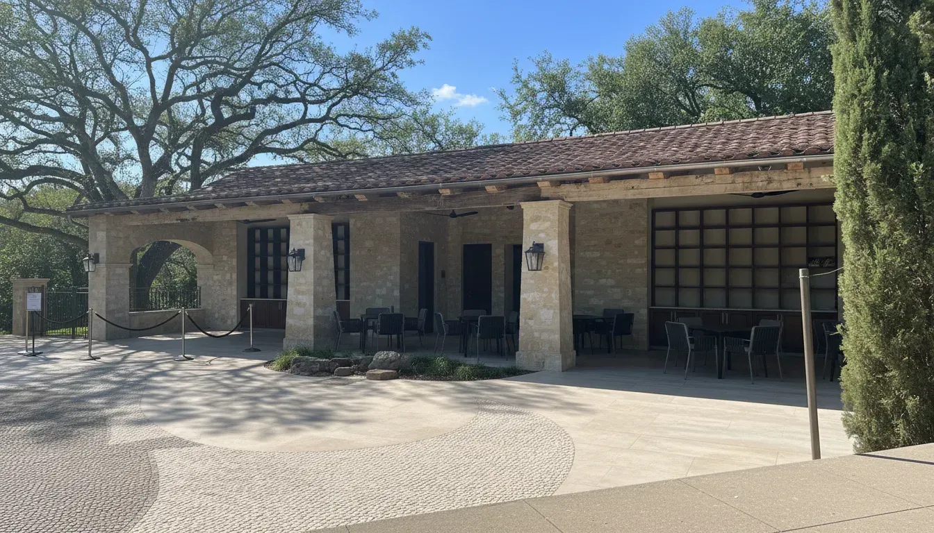 Covered stone patio beside the resort pool